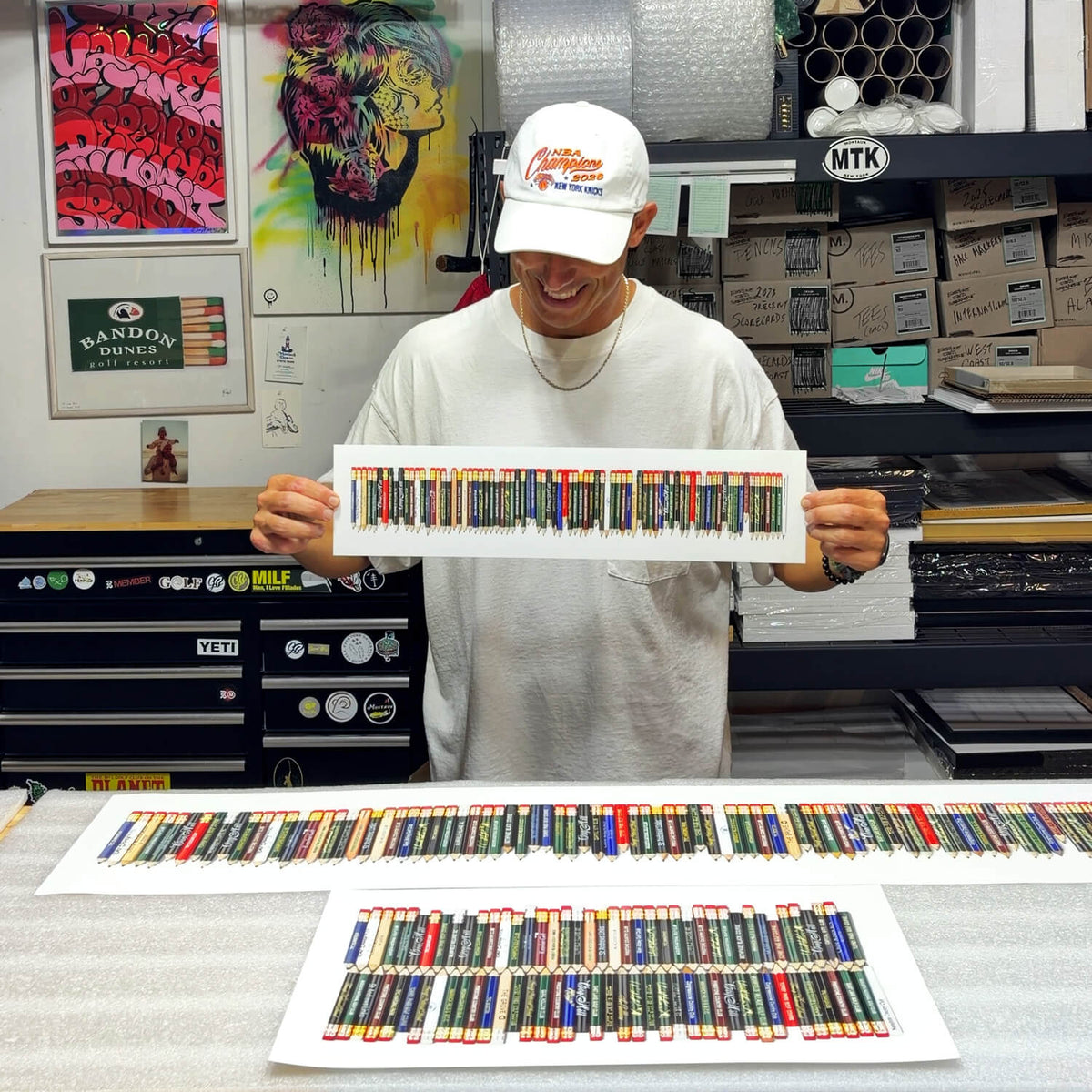 A fine art piece featuring a collection of golf pencils from all the golf courses Tiger Woods won on the PGA TOUR. 