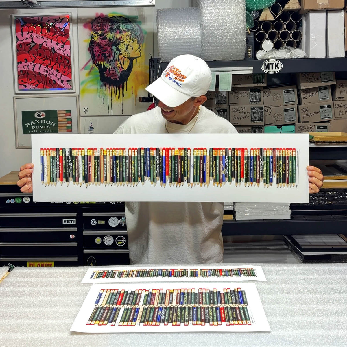 A fine art piece featuring a collection of golf pencils from all the golf courses Tiger Woods won on the PGA TOUR. 